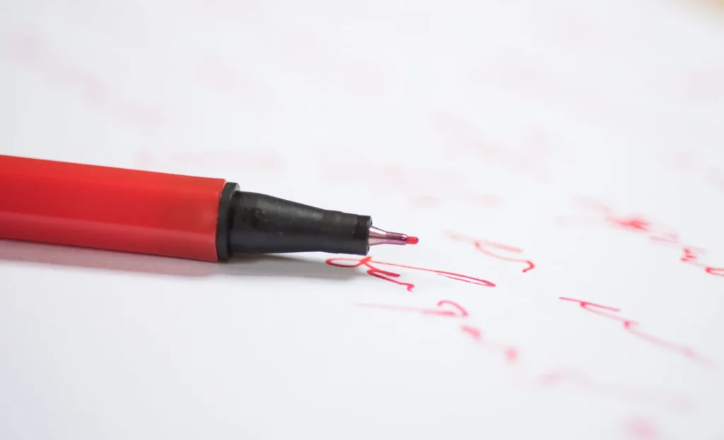 red pen paper termination clauses KPA Lawyers